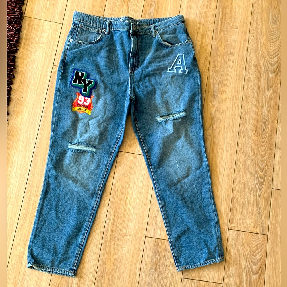 Distressed, graphic, denim jeans, size 19 in women’s